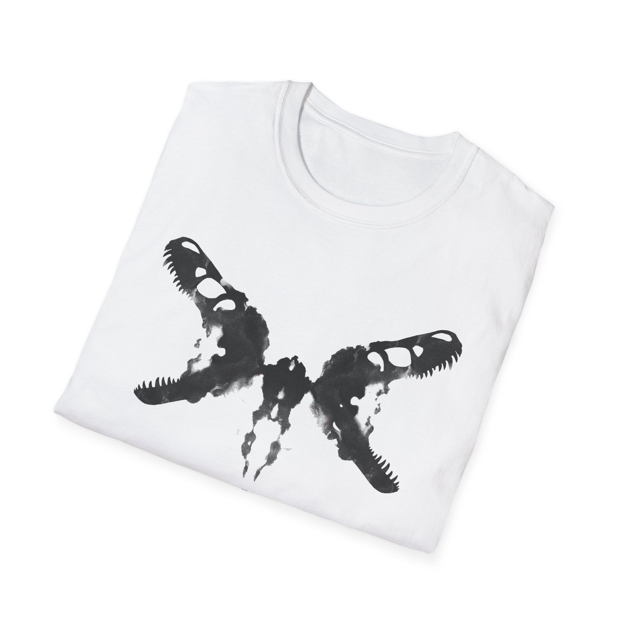 A folded white crew neck t-shirt with a black dinosaur skull Rorschach inkblot design.
